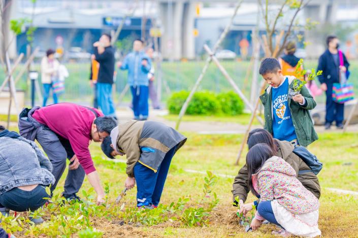 Many children and adults participated in the Arbor Day activities.