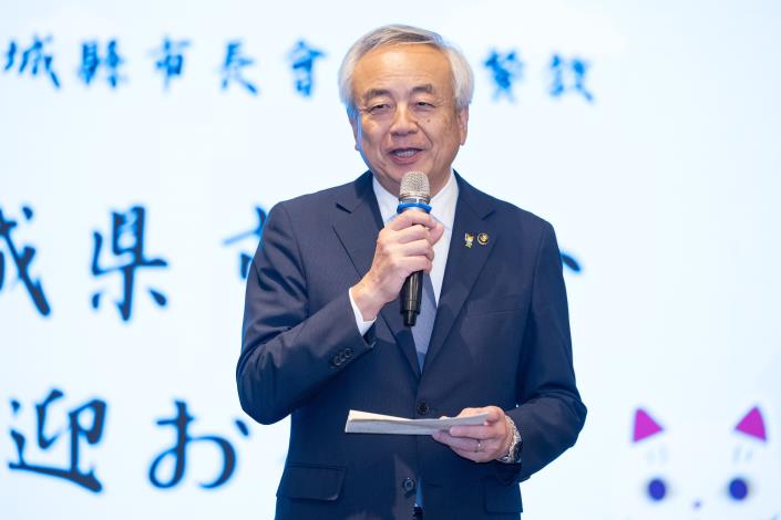 Mayor Shigeru Sugawara of Kesennuma delivers remarks during the visit